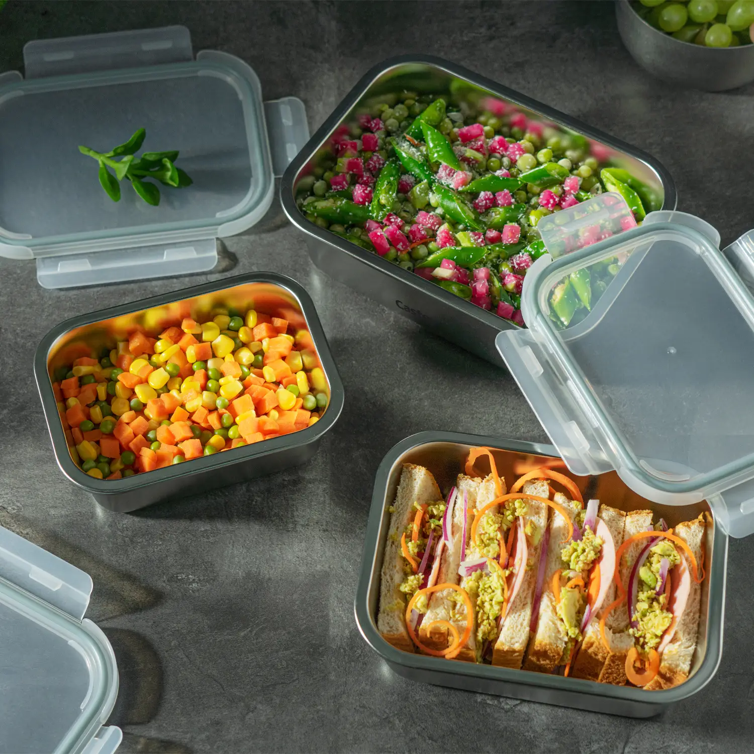 Envases Herméticos de Acero Inoxidable con Tapa Antiderrames Envases de acero inoxidable herméticos y antiderrames con tapa de silicona, aptos para microondas, horno y congelador